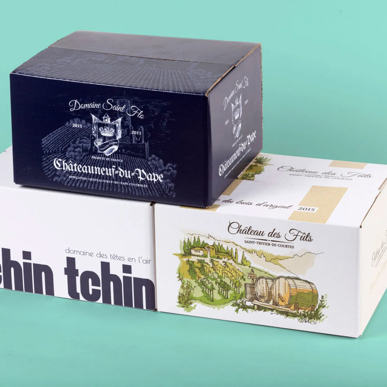 Caisses de vin personnalisées Tchin Tchin et châteaux, empilées